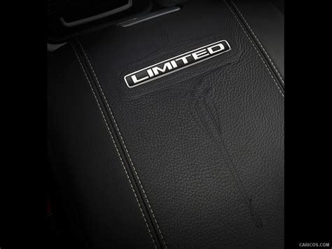 2015 Ram 1500 Laramie Limited Edition - Armrest - Interior Detail | Caricos