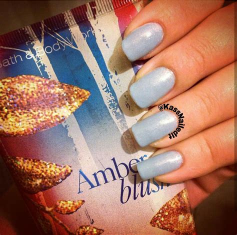 Beautiful baby blue nail polish with a hint of glitter. Follow @KassNailedIt on instagram ...