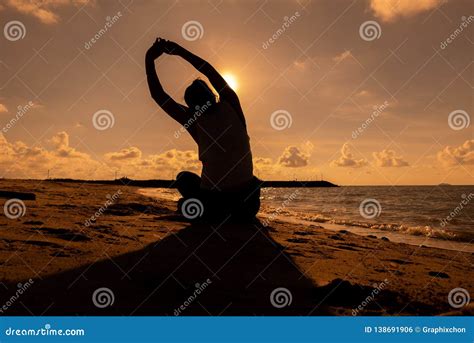 Silhouette Woman Yoga on the Beach Sunset. Stock Photo - Image of girl, firm: 138691906