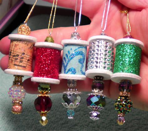 Fabric Thread on Spools Make Pretty Ornaments | Wooden spool crafts, Spool crafts, Christmas ...