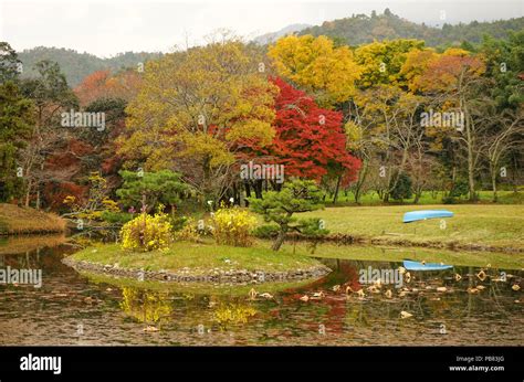 Lake scenery with autumn trees in Kyoto, Japan Stock Photo - Alamy