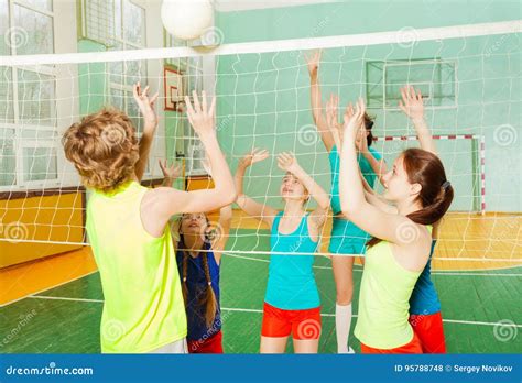 Teenagers Playing Volleyball in School Gymnasium Stock Photo - Image of defense, match: 95788748