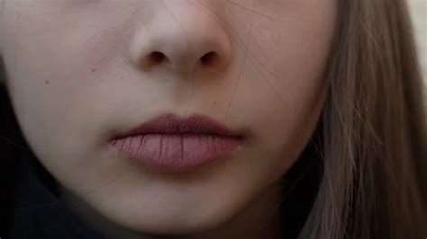 Close - up of Lips smiling teen girl, ch... | Stock Video | Pond5