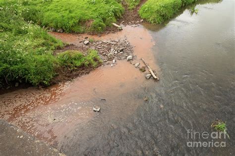 Silt Flowing Into A River Photograph by Andy Davies/science Photo Library - Fine Art America