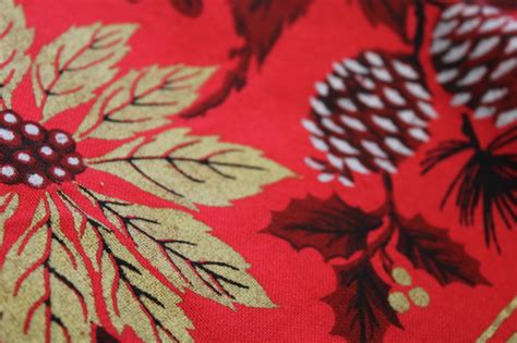 vintage Christmas print cotton tablecloth, red w/ poinsettias in metallic gold