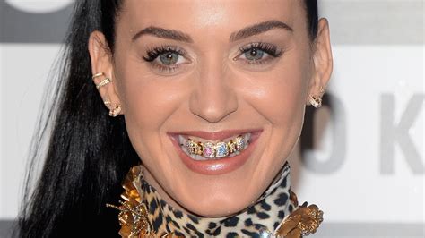 Why You Should Think Twice Before Getting A Tooth Gem Or Grills