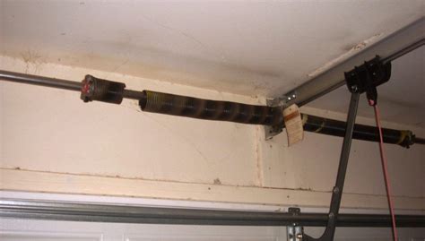 Garage Door Torsion Spring Replacement Cost — Schmidt Gallery Design