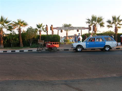 Free Images : asphalt, downtown, travel, transport, suburb, vehicle, nikon, lane, parking lot ...