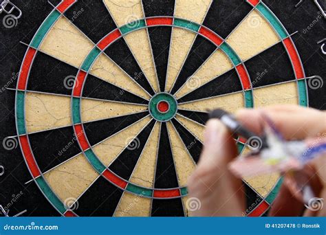 Hand Throwing Dart Stock Photo - Image: 41207478