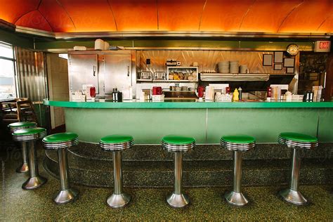 "Vintage Diner Interior With Stools At Counter" by Stocksy Contributor "Raymond Forbes LLC ...