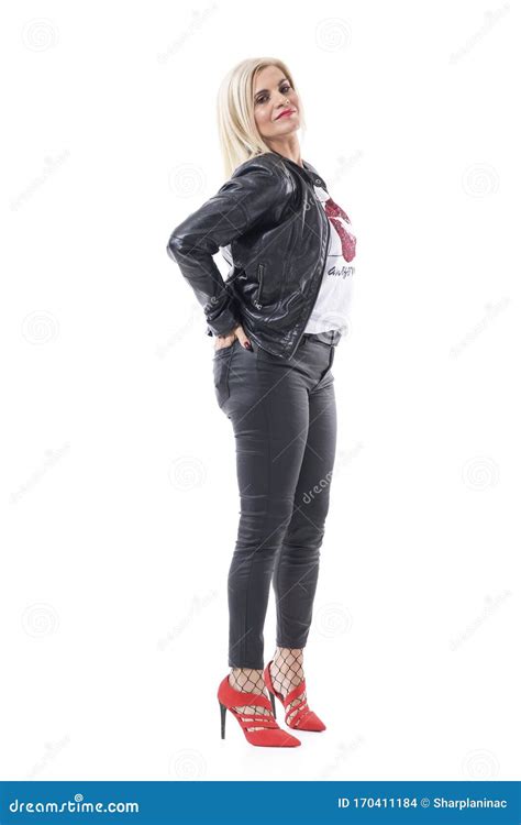 Side View of Attractive Middle Aged Woman in Stylish Black Leather Clothes Posing Stock Photo ...