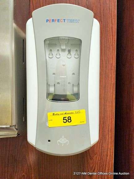 GOJO HAND SANITIZER DISPENSER - Bentley & Associates, LLC