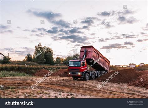 Dump Truck Dumping Gravel On Excavation Stock Photo 1623833956 ...