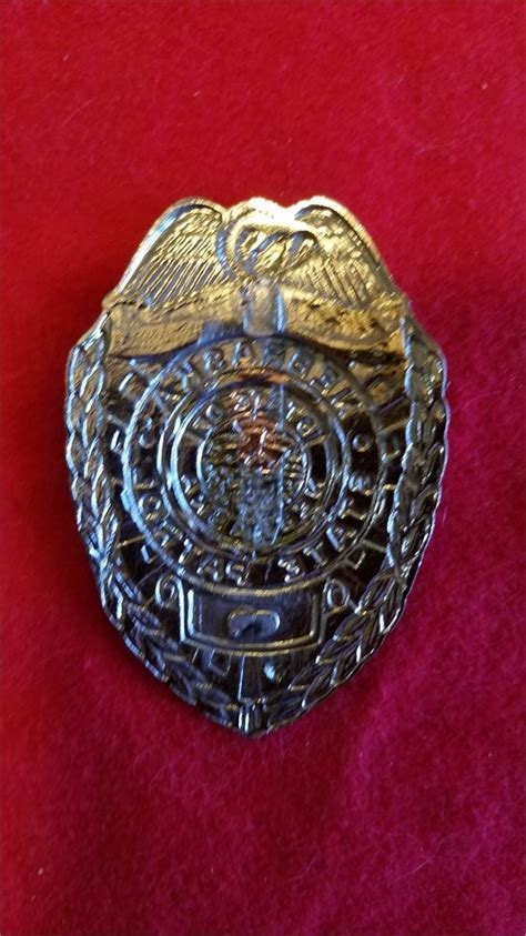 Collectors-Badges Auctions - Nebraska state police