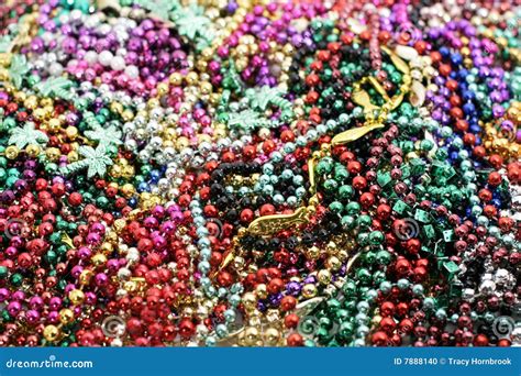 Pile of mardi gras beads stock photo. Image of jewelry - 7888140