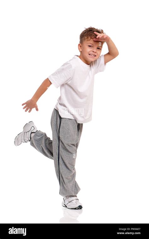 Happy little hip hop dancer - boy dancing isolated on white background ...