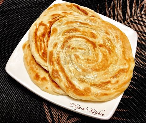 Kerala Parotta ~ layered flaky flat bread, a delicacy from the state of kerala. It is also known ...