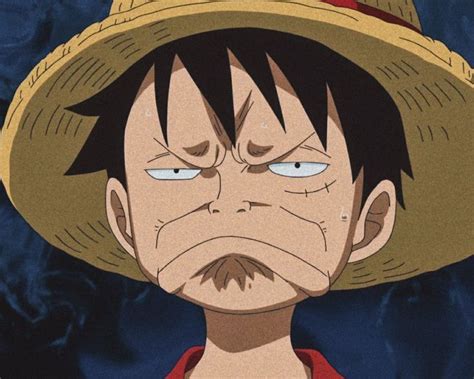 one piece character wearing a straw hat and staring at the camera with ...