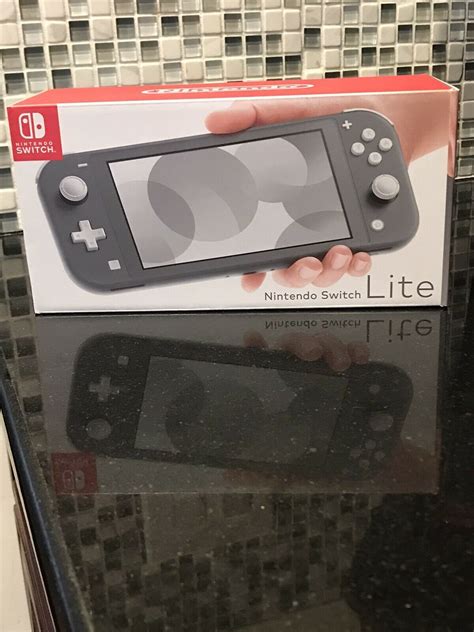 Nintendo Switch Lite - Gray - iCommerce on Web