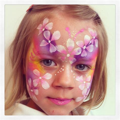 Girly flower face painting ideas | Face painting, Carnival face paint ...