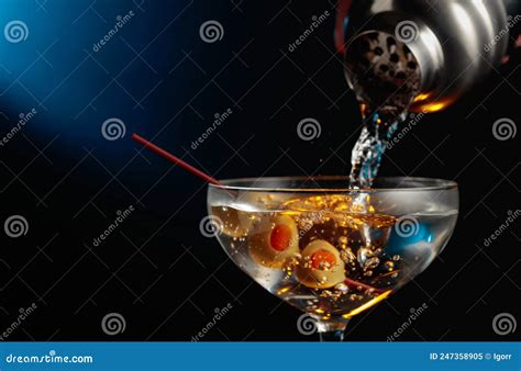 Martini with green olives stock image. Image of olive - 247358905