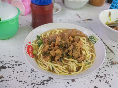 chicken noodles. a typical street food from Indonesia. is a fairly famous street food 13247309 ...