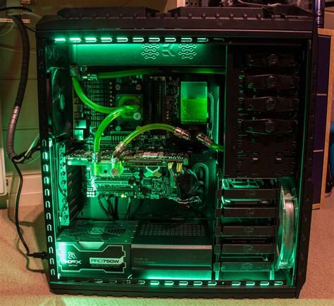 the inside of a computer case with green lights
