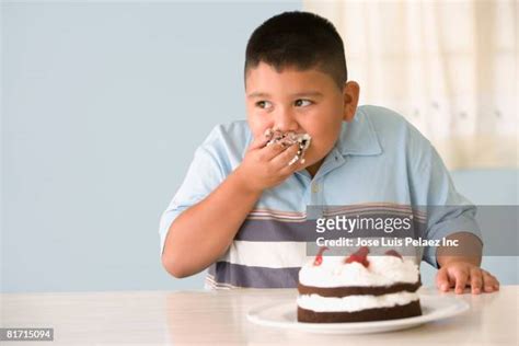 143 Fat Kid Eating Cake Stock Photos, High-Res Pictures, and Images - Getty Images