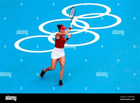 TOKYO, JAPAN - JULY 29: Belinda Bencic of Team Switzerland hits a ...