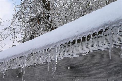 House Covered in Snow & Ice? 5 Tips to Help You Safely Remove Icicles & Snow From Your Roof ...