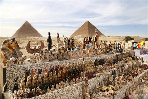 Egyptian souvenirs on a market a front of pyramids of Giza, Egypt ...