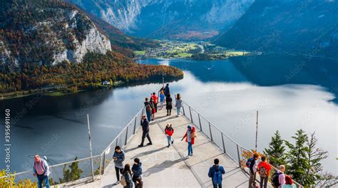 Hallstatt Skywalk World Heritage View (Welterbeblick). Tourists visiting Skywalk platform ...