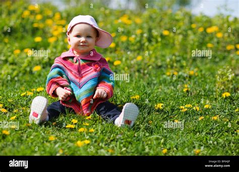 Cute 1 year old baby girl outdoors Stock Photo - Alamy
