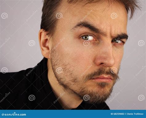 Portrait of a Man, Suspicious Look, Closeup Stock Image - Image of face, eyebrows: 68259883