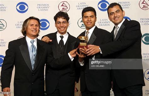 Banda Cuisillos members hold their trophy for Best Banda Album for ...