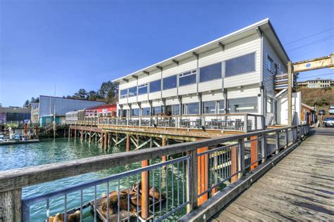 there is a boat dock with many boats in the water