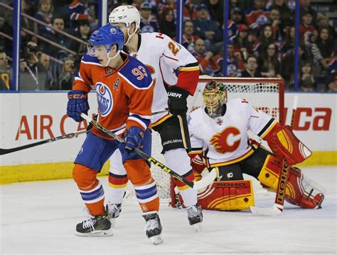 Oilers vs. Flames broadcast invaded by gigantic fly