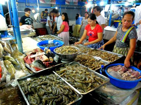 Meat And Fish Vendor In A Wet Market In Cubao , Quezon City ...