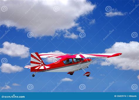 Colorful Red Plane in Flight Stock Photo - Image of colorful, flying: 2682974