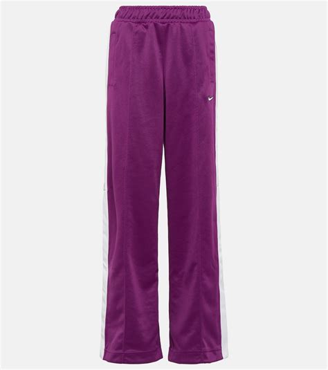 W Nsw Pk track pants in purple - Nike | Mytheresa