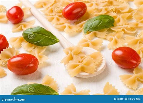 Raw farfalle bow-tie pasta stock photo. Image of pattern - 86015130