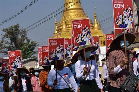 Myanmar protesters getting permanent symbols of resistance -- tattoos | CNN