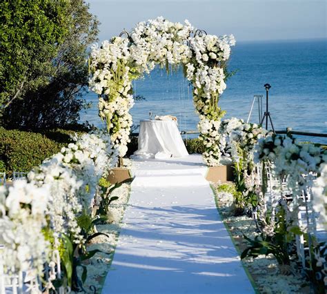 Wedding Ceremony Ideas: Flower-Covered Wedding Arch - Inside Weddings