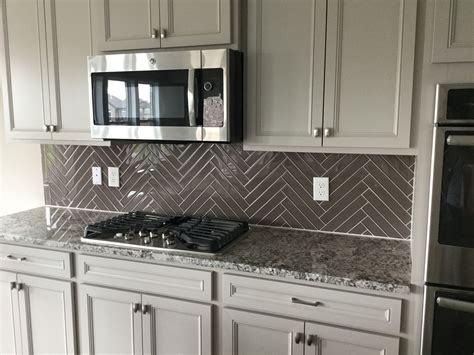 Color Wave 2x12 glass tile in herringbone pattern | Greige kitchen ...