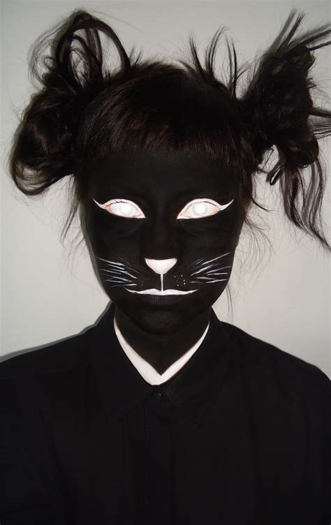 Black cat - Makeup Tutorial | Cat makeup tutorial, Cat halloween makeup, Black cat makeup