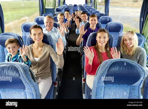 group of happy passengers travelling by bus Stock Photo - Alamy