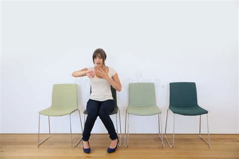 Impatient Woman in Waiting Room Stock Image - Image of woman, waiting: 55037105