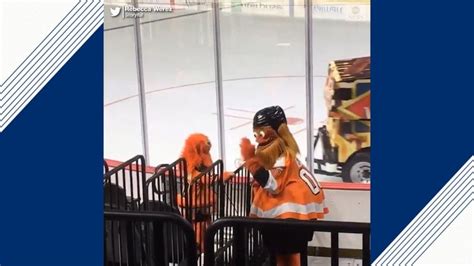 Video Flyers mascot Gritty has dance off with 8-year-old fan - ABC News