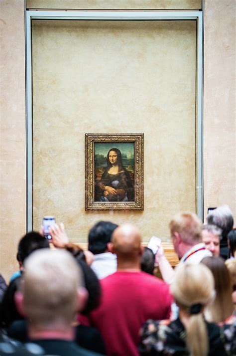 Mona Lisa portrait in Louvre museum in Paris, France. Photograph by ...