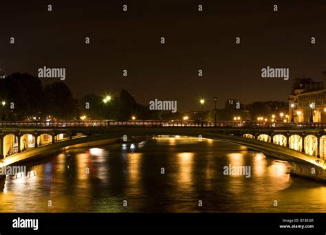 Along the Seine River in Paris at night Stock Photo - Alamy